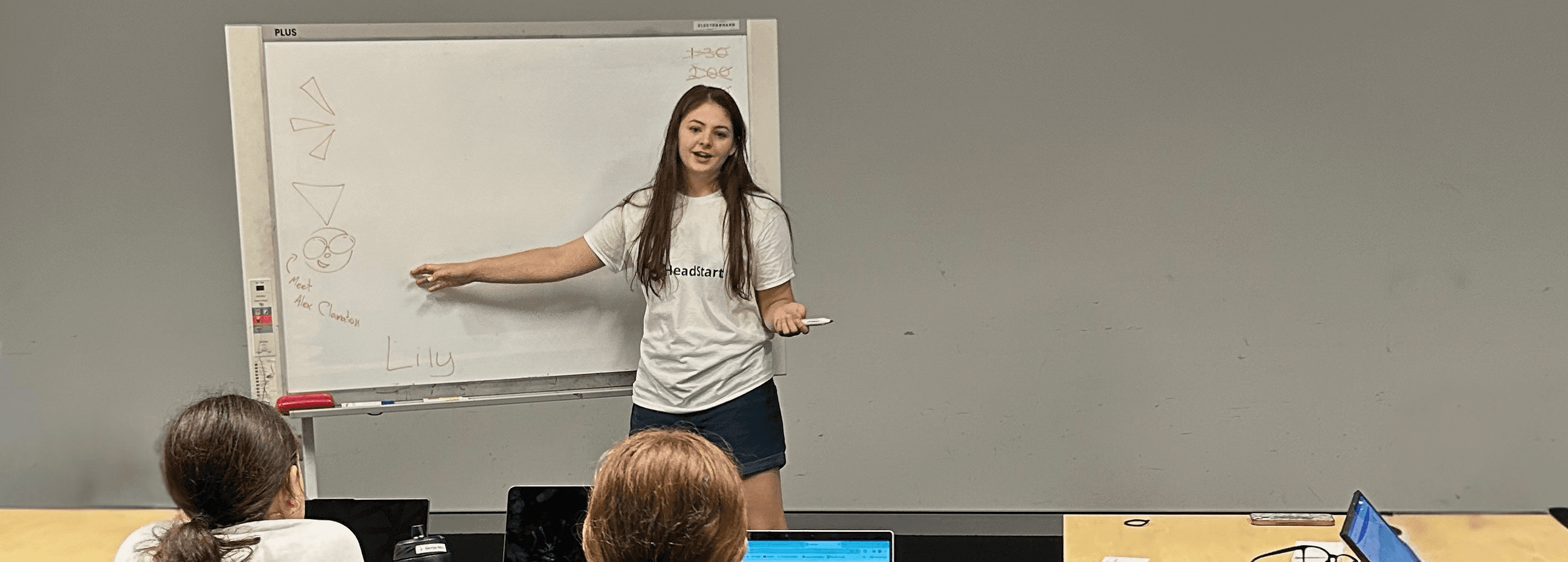 Lily teaching a small group in a calm classroom setting